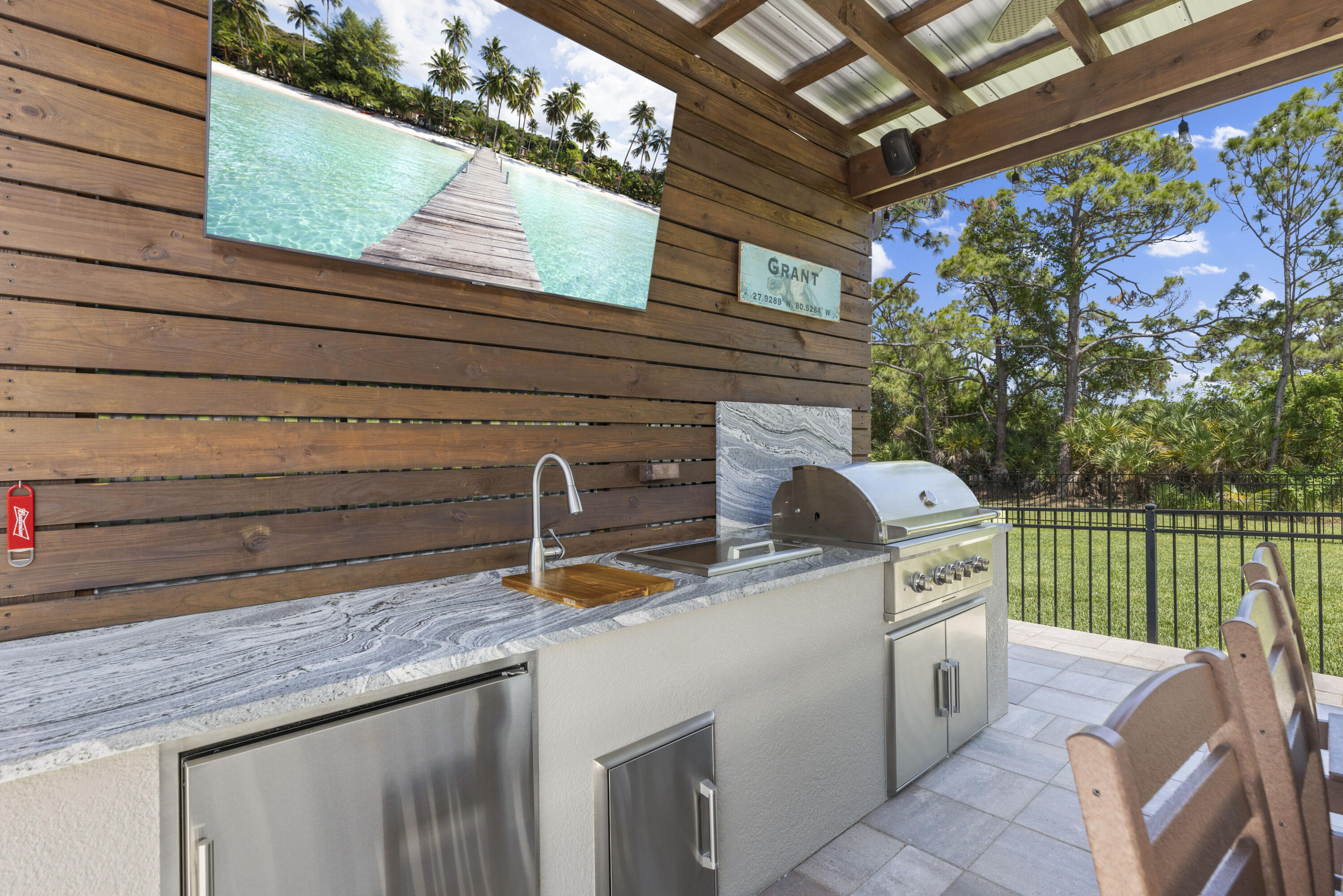 4544 Celestial Drive Grant Valkaria, FL 32949 - Photo 59 of 73 a view of a kitchen with a sink and dishwasher