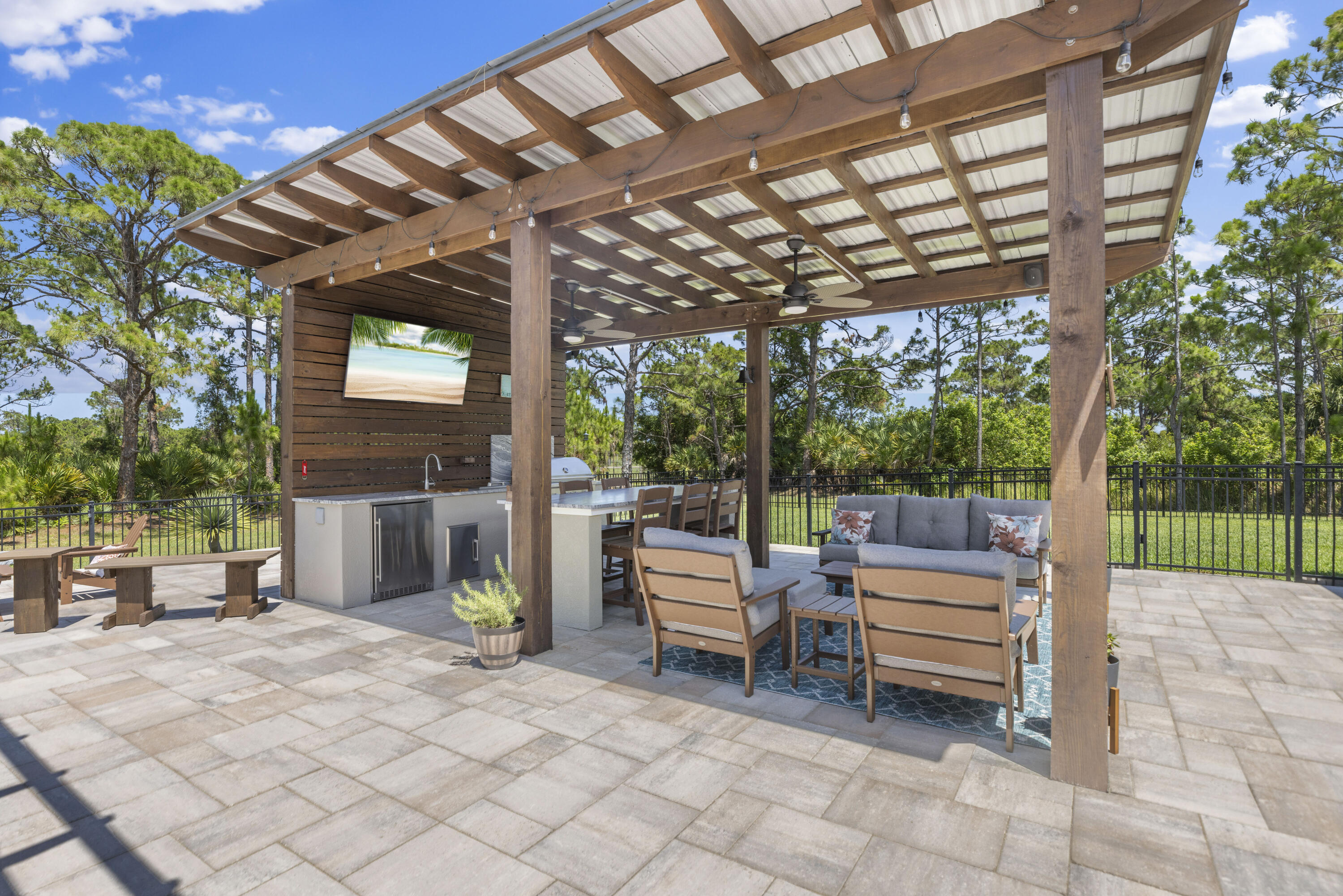 4544 Celestial Drive Grant Valkaria, FL 32949 - Photo 60 of 73 a view of a chairs and tables in the patio