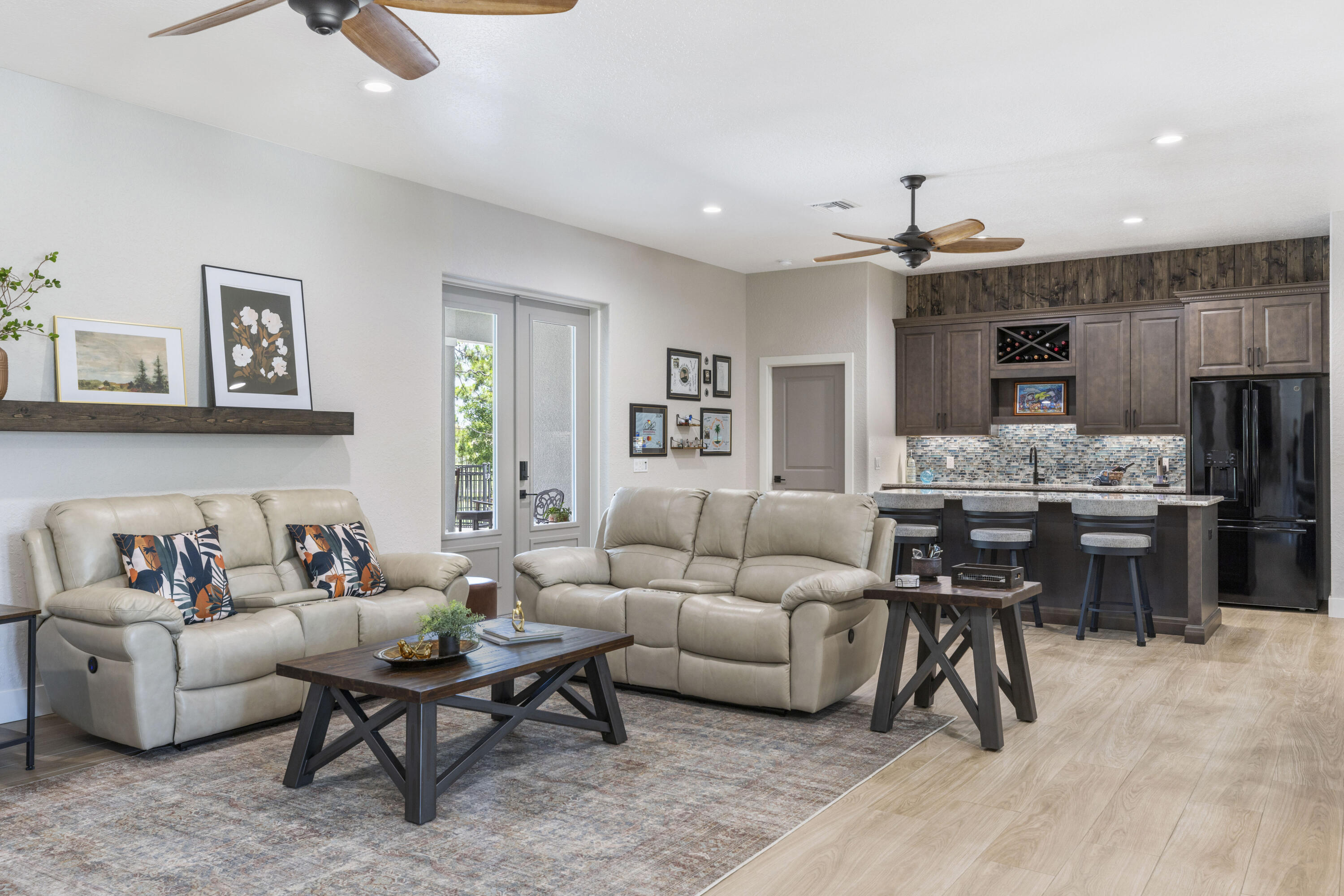 4544 Celestial Drive Grant Valkaria, FL 32949 - Photo 6 of 73 a living room with furniture and kitchen view