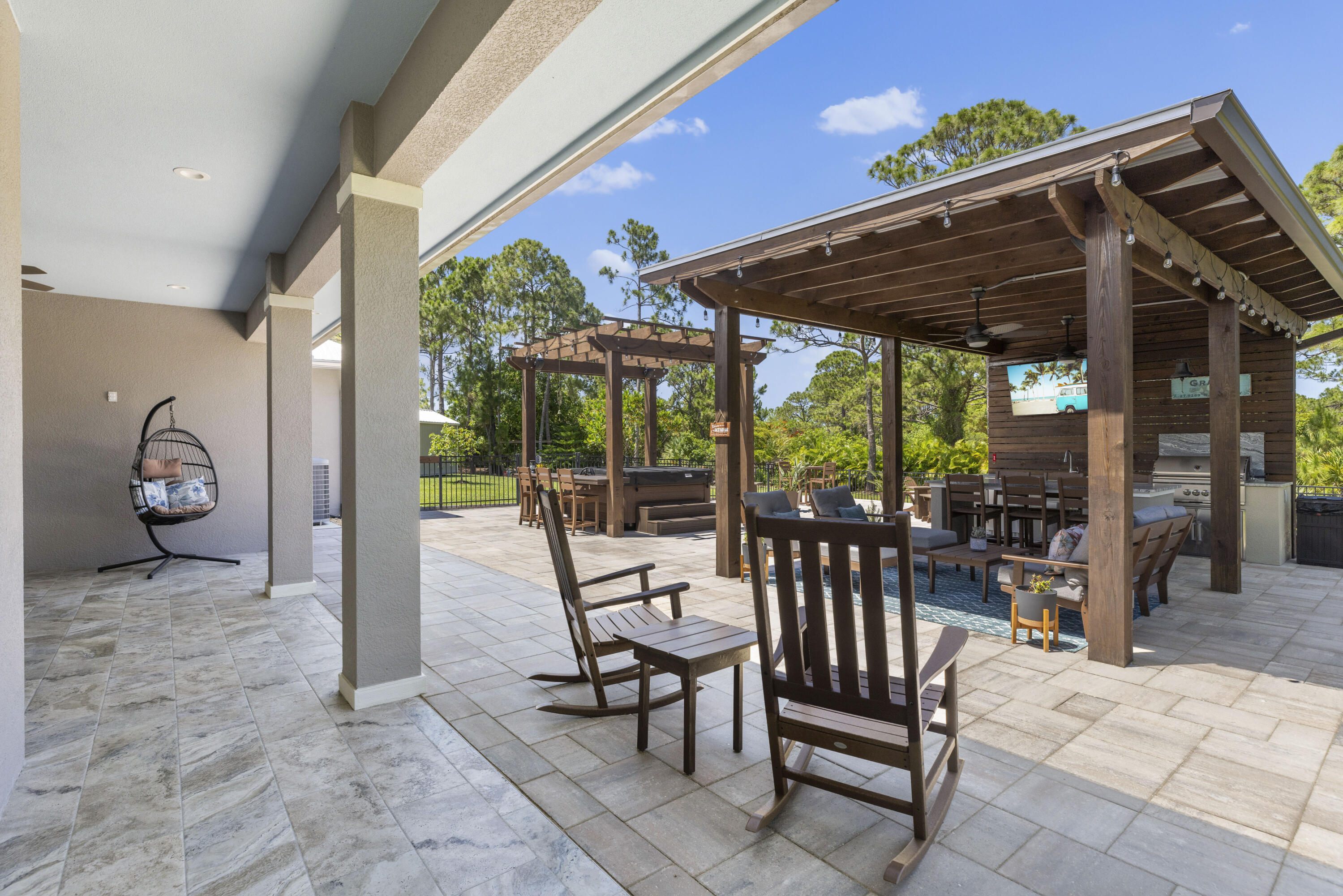 4544 Celestial Drive Grant Valkaria, FL 32949 - Photo 61 of 73 a view of porch with a table and chairs