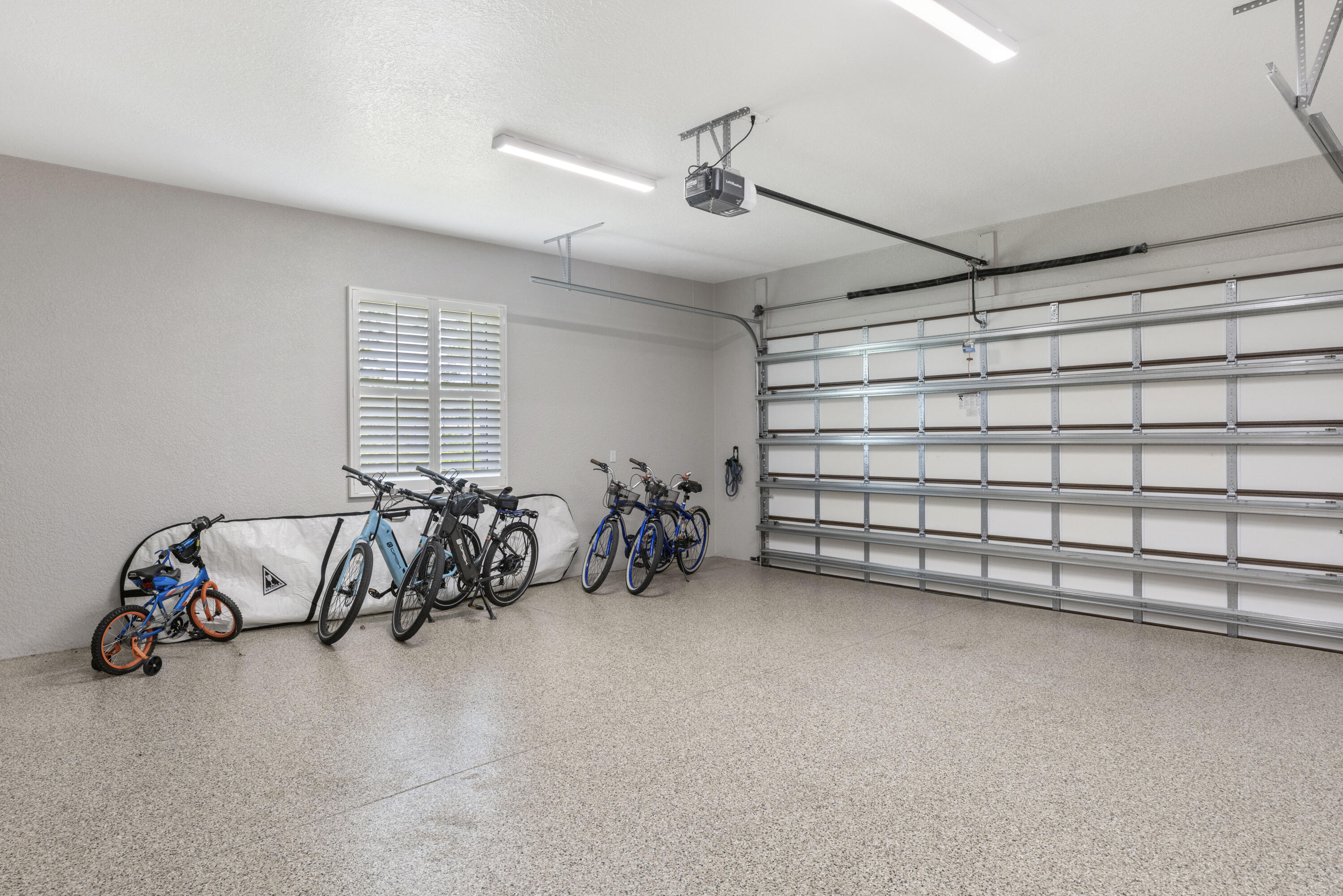 4544 Celestial Drive Grant Valkaria, FL 32949 - Photo 64 of 73 a view of a livingroom with gym equipment and a couch