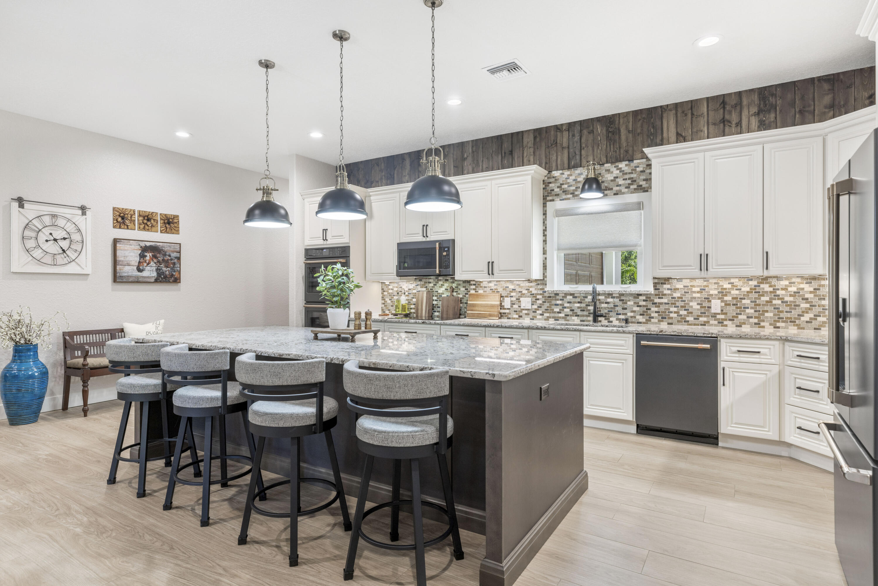 4544 Celestial Drive Grant Valkaria, FL 32949 - Photo 7 of 73 a kitchen with a sink and stove