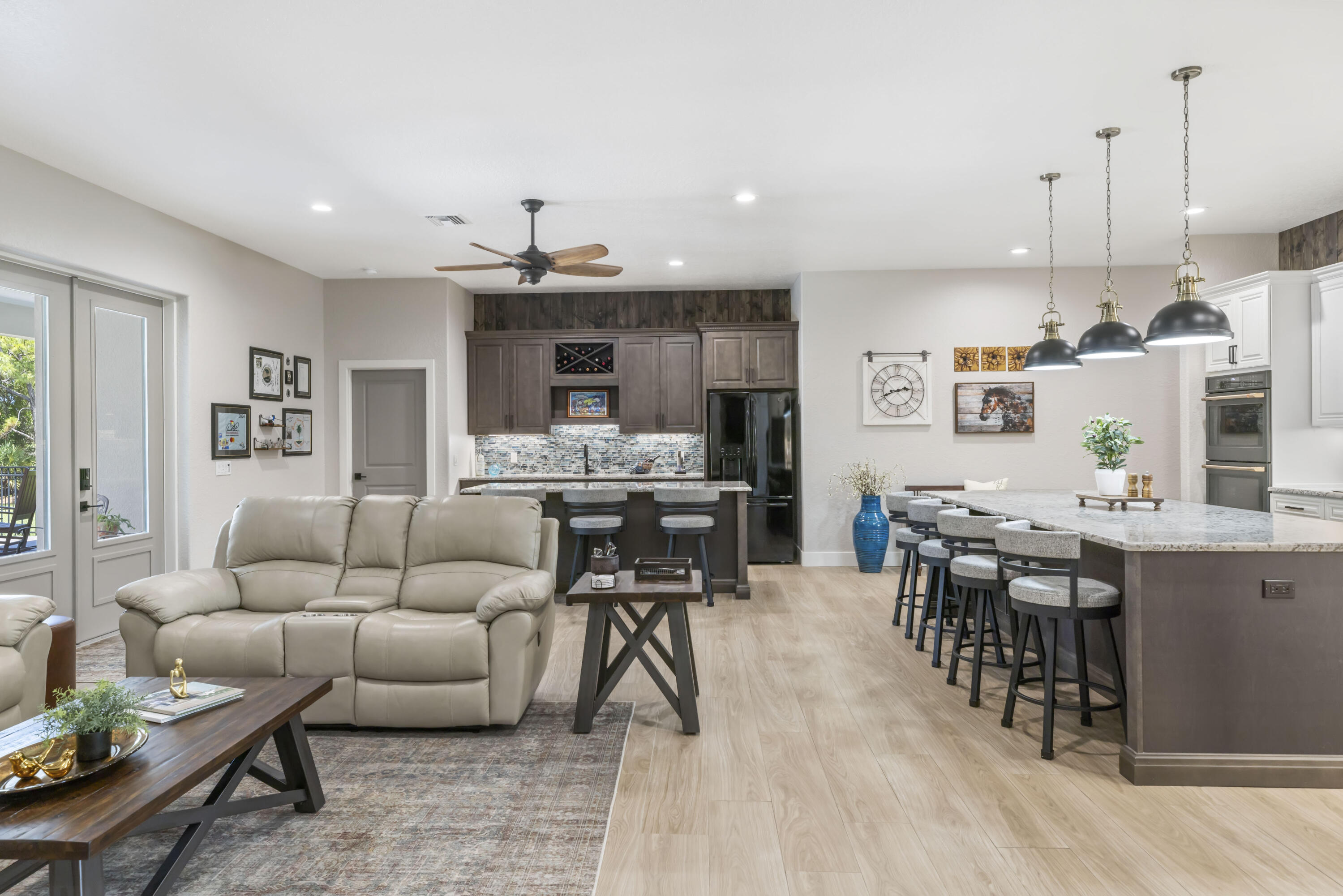 4544 Celestial Drive Grant Valkaria, FL 32949 - Photo 10 of 73 a living room kitchen with furniture and kitchen view