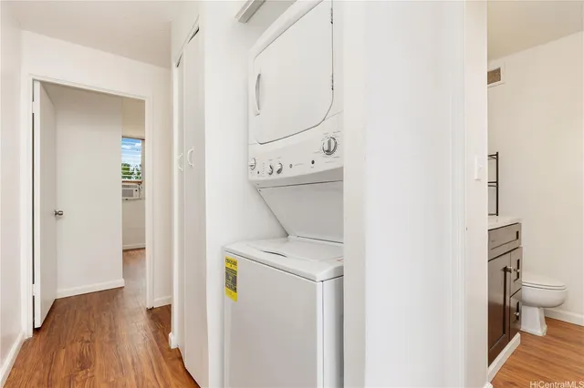a view of bathroom with a sink toilet and a mirror