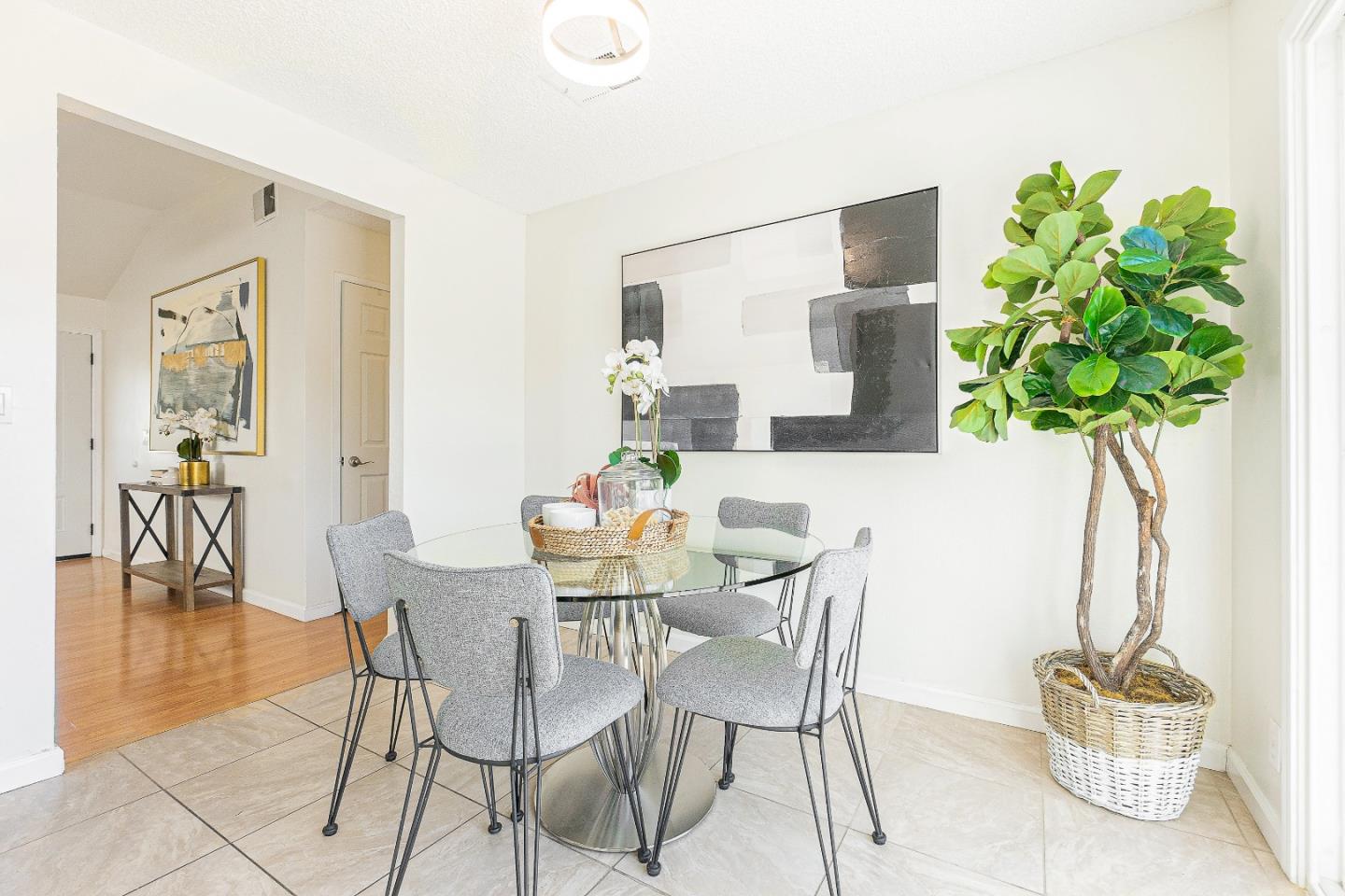 2051 Nunes Drive San Jose, CA 95131 - Photo 14 of 47 a dining room with furniture and a potted plant