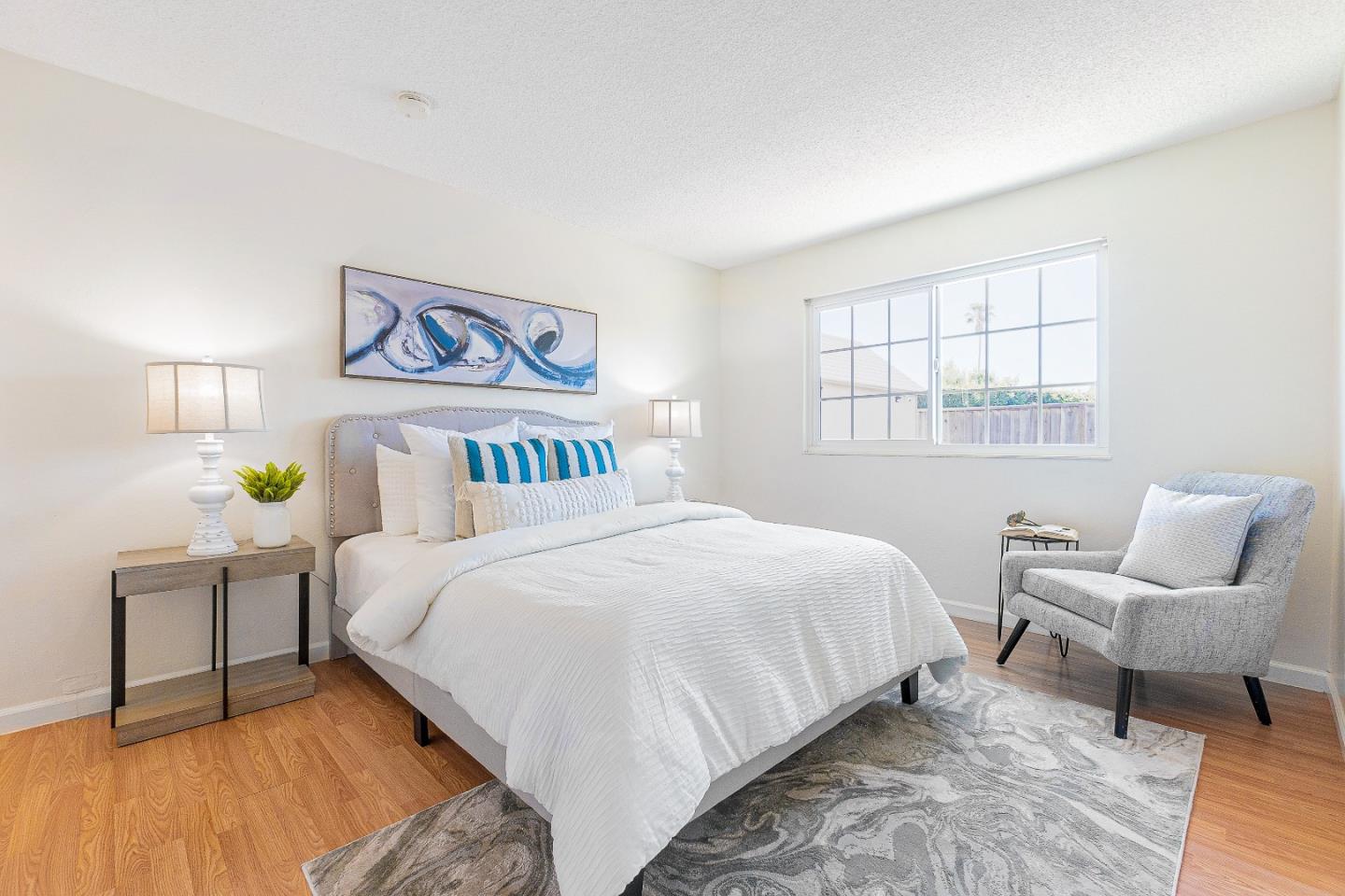 2051 Nunes Drive San Jose, CA 95131 - Photo 20 of 47 a bedroom with a bed and wooden floor