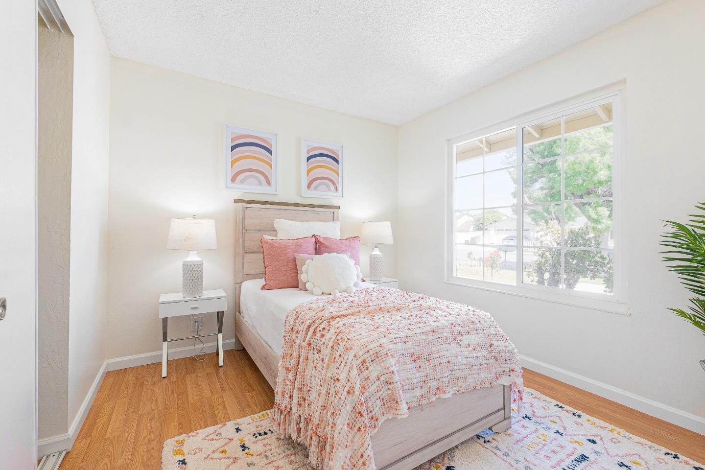 2051 Nunes Drive San Jose, CA 95131 - Photo 23 of 47 a bedroom with a bed and a window