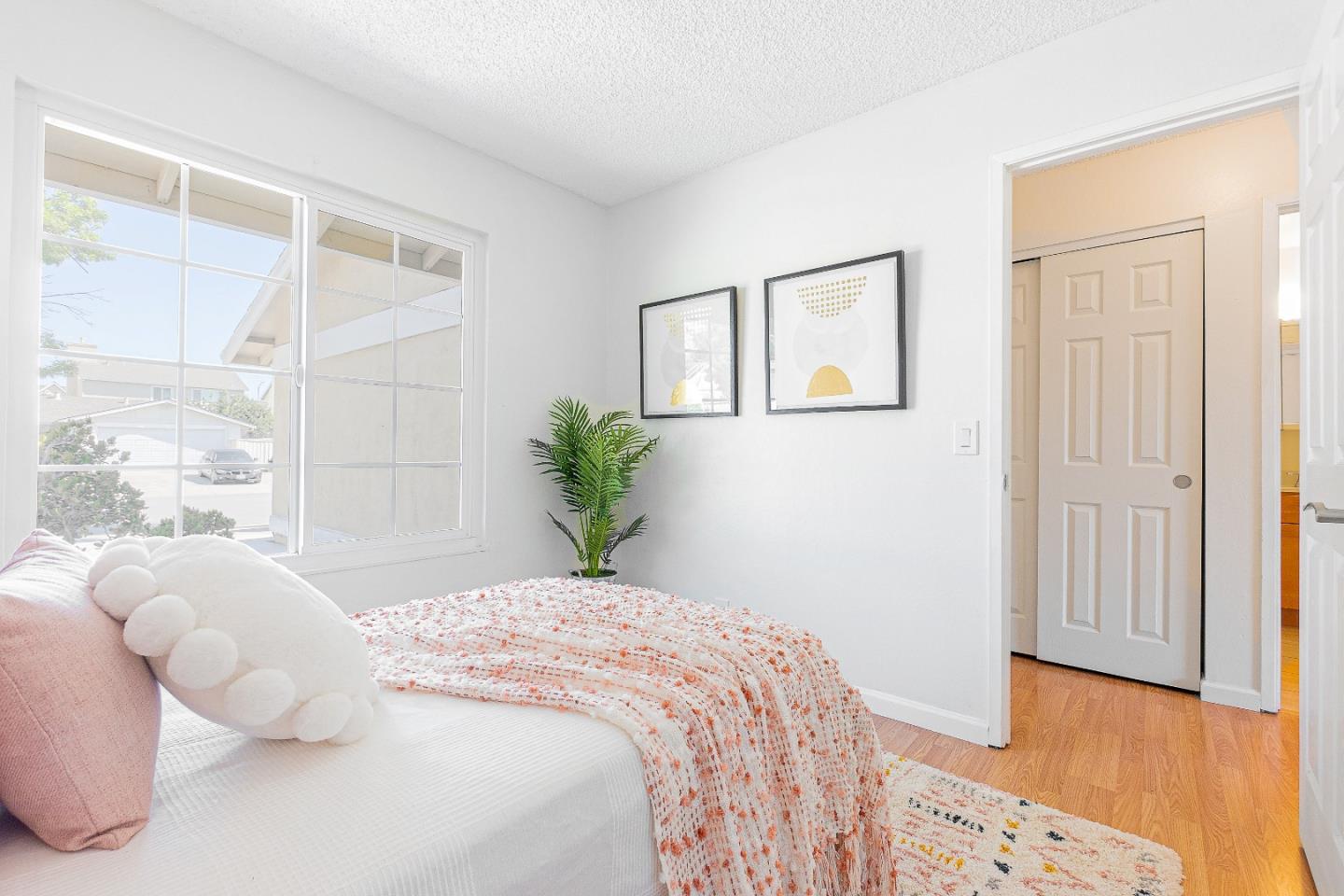 2051 Nunes Drive San Jose, CA 95131 - Photo 24 of 47 a bedroom with a bed and a window