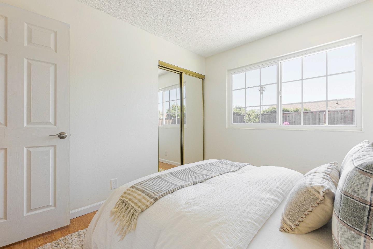 2051 Nunes Drive San Jose, CA 95131 - Photo 26 of 47 a bedroom with a bed and a window