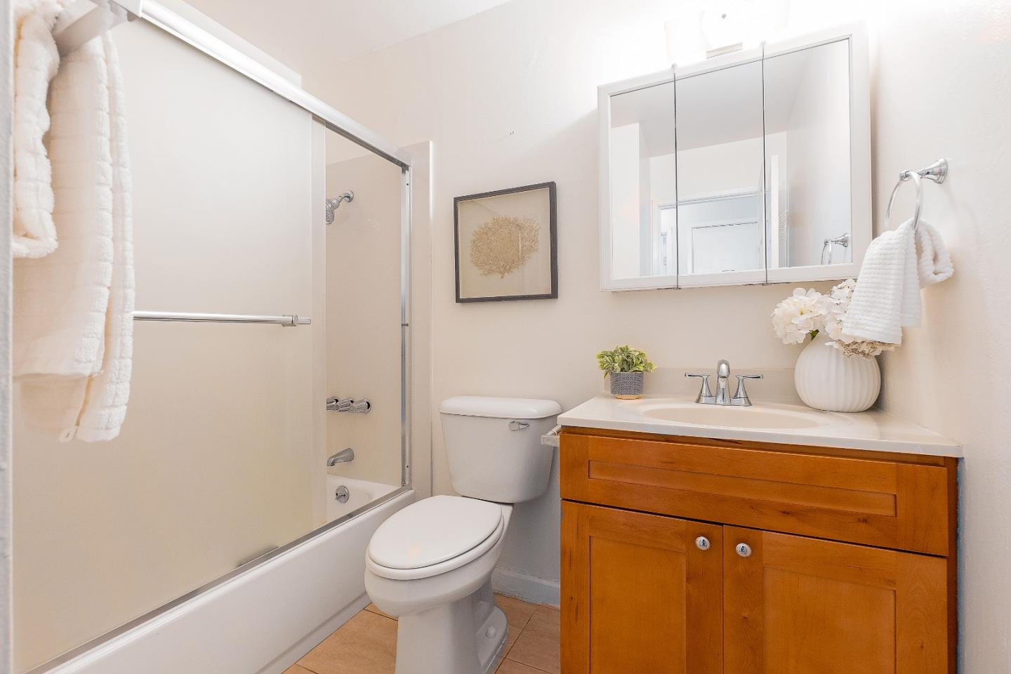 2051 Nunes Drive San Jose, CA 95131 - Photo 27 of 47 a bathroom with a sink a toilet and vanity