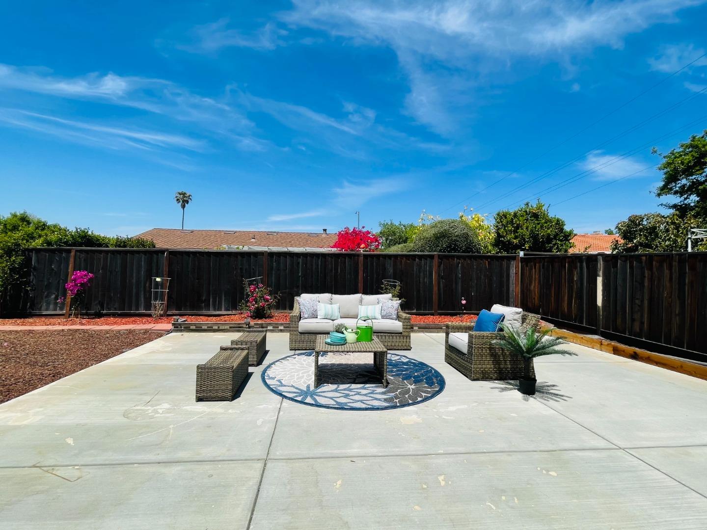 2051 Nunes Drive San Jose, CA 95131 - Photo 32 of 47 a backyard of a house with table and chairs