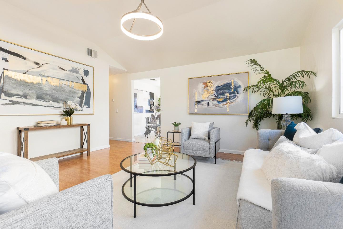 2051 Nunes Drive San Jose, CA 95131 - Photo 9 of 47 a living room with furniture a table and chairs