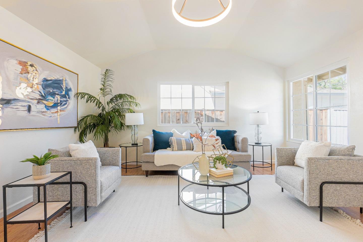 2051 Nunes Drive San Jose, CA 95131 - Photo 10 of 47 a living room with furniture a table and a large window