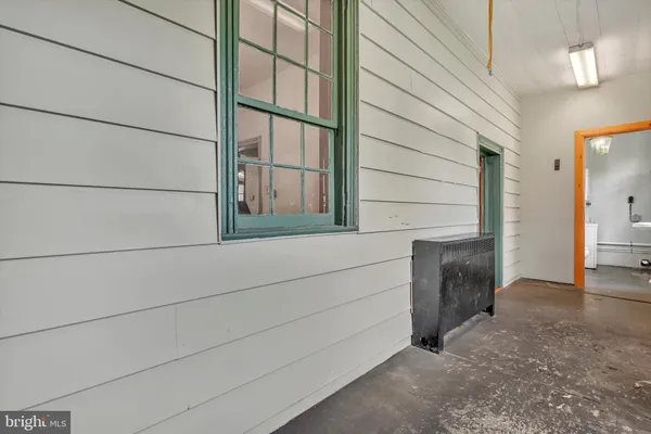 a bathroom with a toilet and a sink