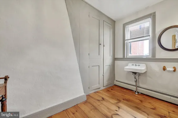 a bathroom with a shower and a toilet