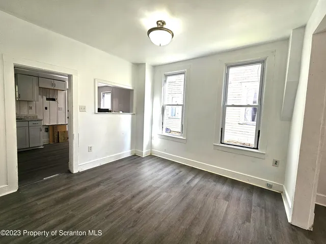 a view of livingroom with hardwood floor and window