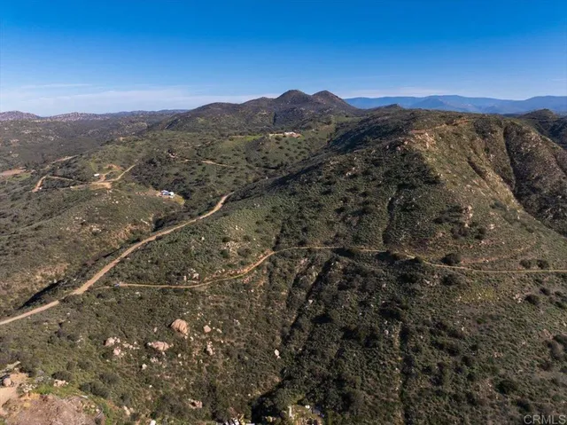 a view of a lake with mountain
