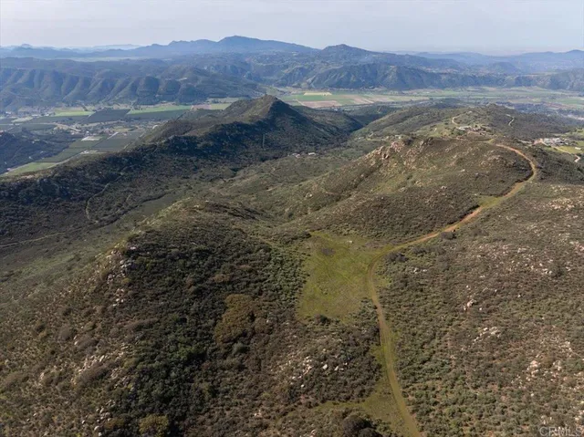 a view of mountain view with trees