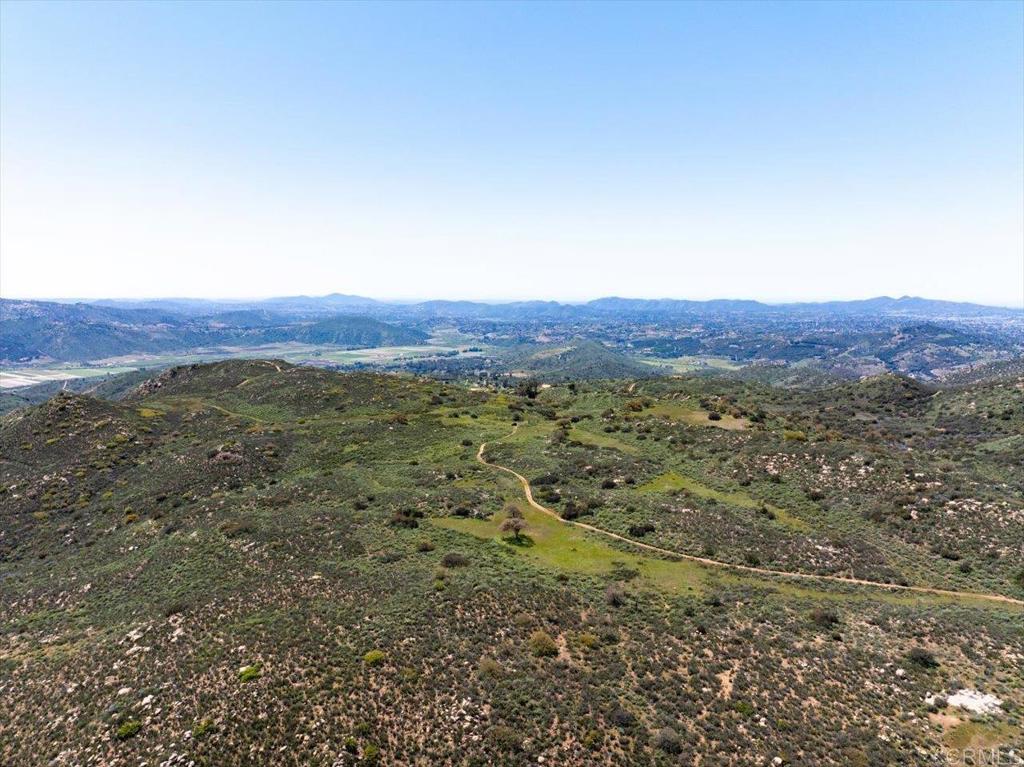 Rockwood Road Escondido, CA 92027 - Photo 22 of 30 a view of a lush green field with lots of bushes