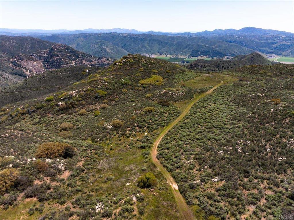 Rockwood Road Escondido, CA 92027 - Photo 26 of 30 a view of a lush green field with lots of bushes