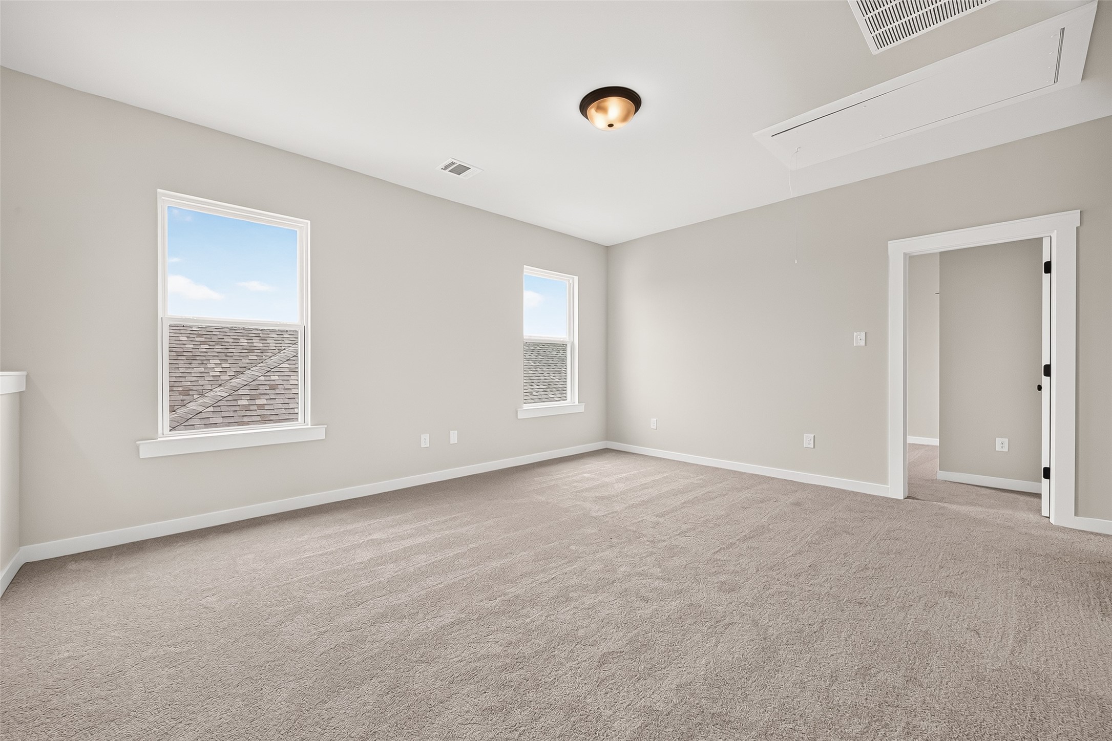 21122 Autumn Heights Rosharon, TX 77583 - Photo 35 of 42 an empty room with windows and closet