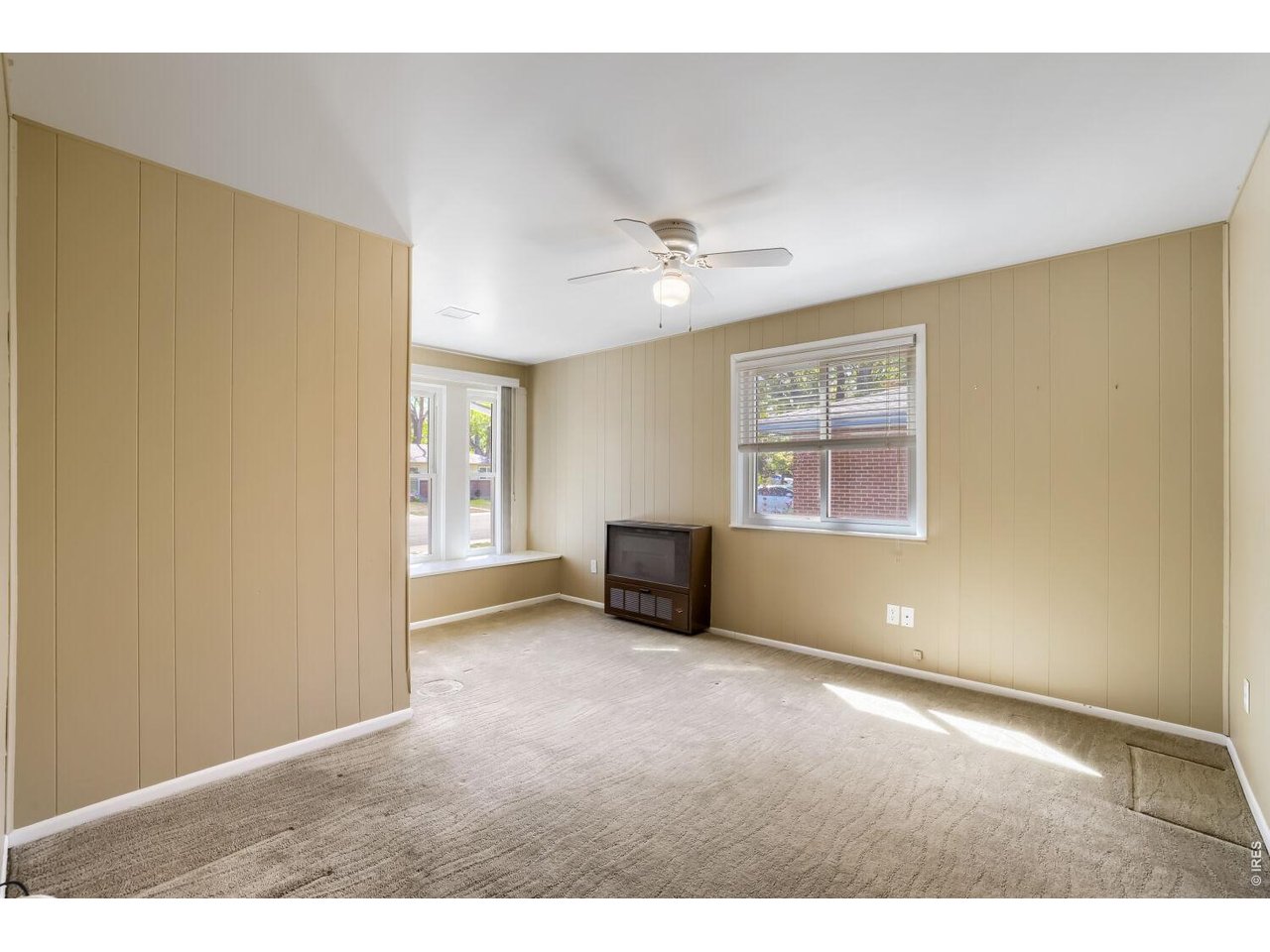 125 South 33rd Street Boulder, CO 80305 - Photo 14 of 17 a view of an empty room with a window