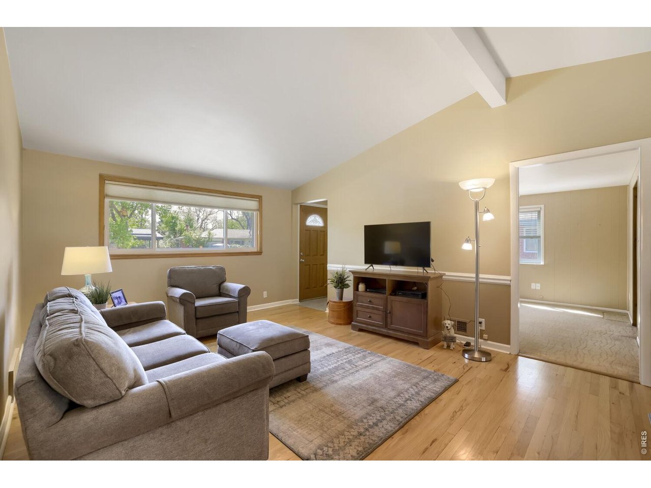 125 South 33rd Street Boulder, CO 80305 - Photo 2 of 17 a living room with furniture and a flat screen tv