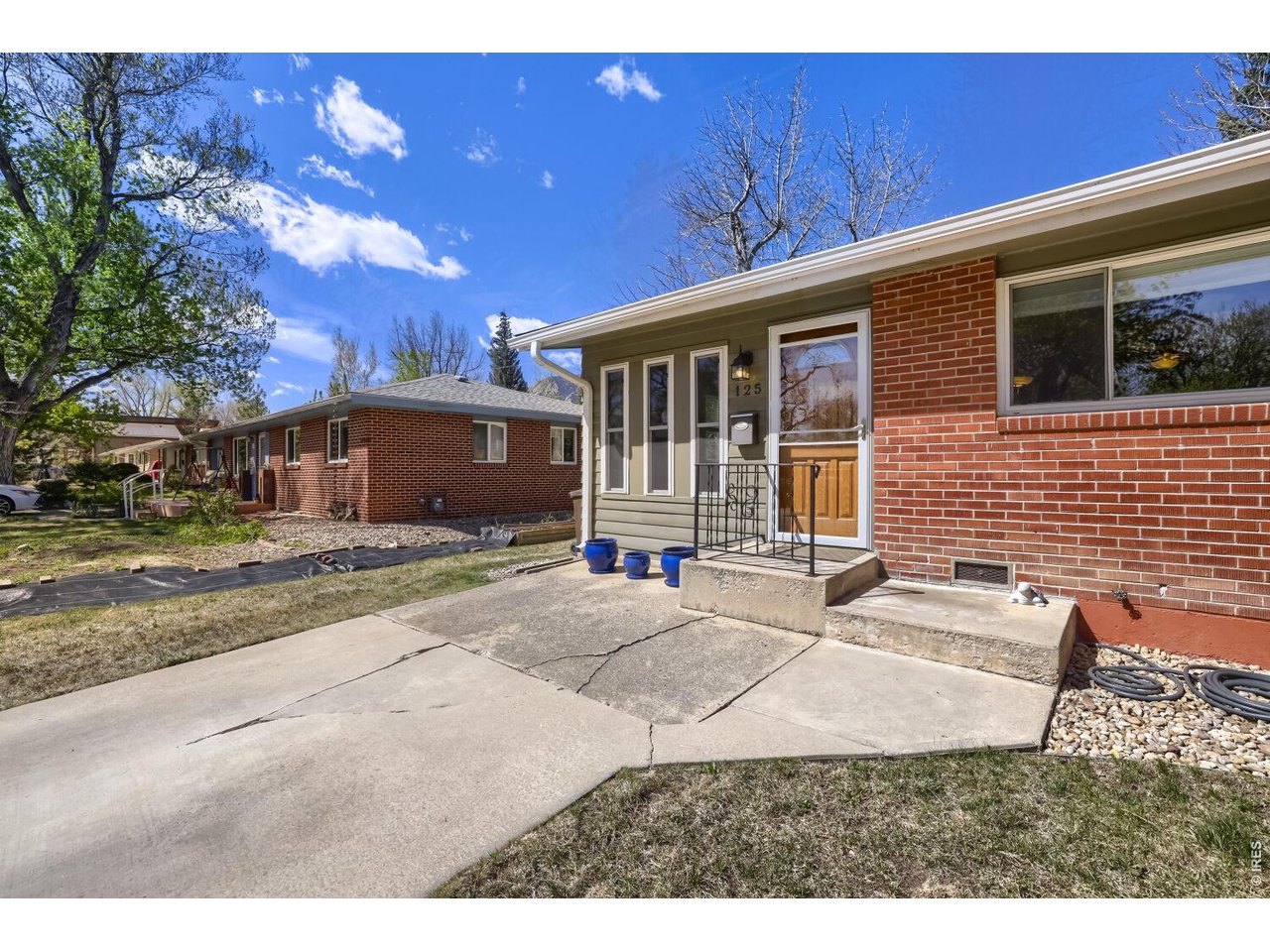 125 South 33rd Street Boulder, CO 80305 - Photo 4 of 17 a view of a house with a patio