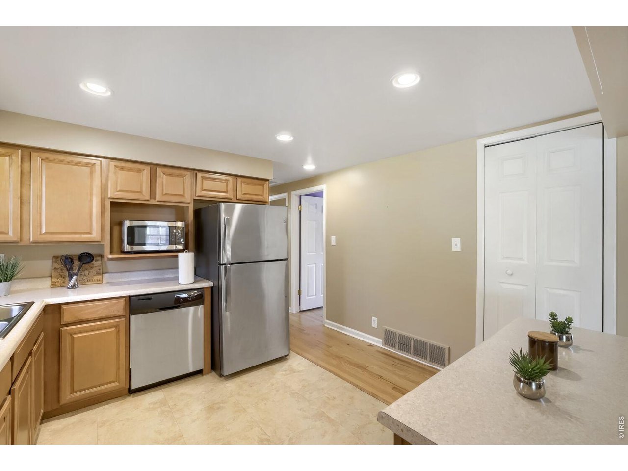 125 South 33rd Street Boulder, CO 80305 - Photo 5 of 17 a kitchen with stainless steel appliances a refrigerator and a sink