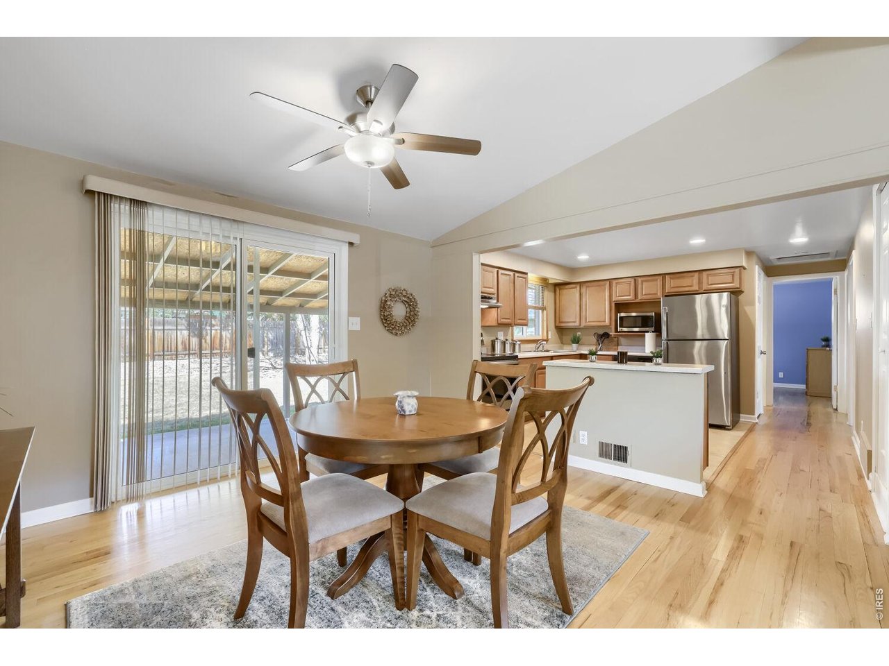 125 South 33rd Street Boulder, CO 80305 - Photo 6 of 17 a view of a dining room with furniture and wooden floor