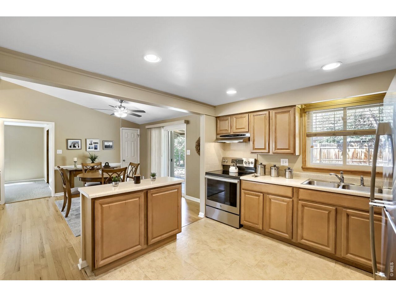 125 South 33rd Street Boulder, CO 80305 - Photo 7 of 17 a kitchen with a sink stove top oven and cabinets