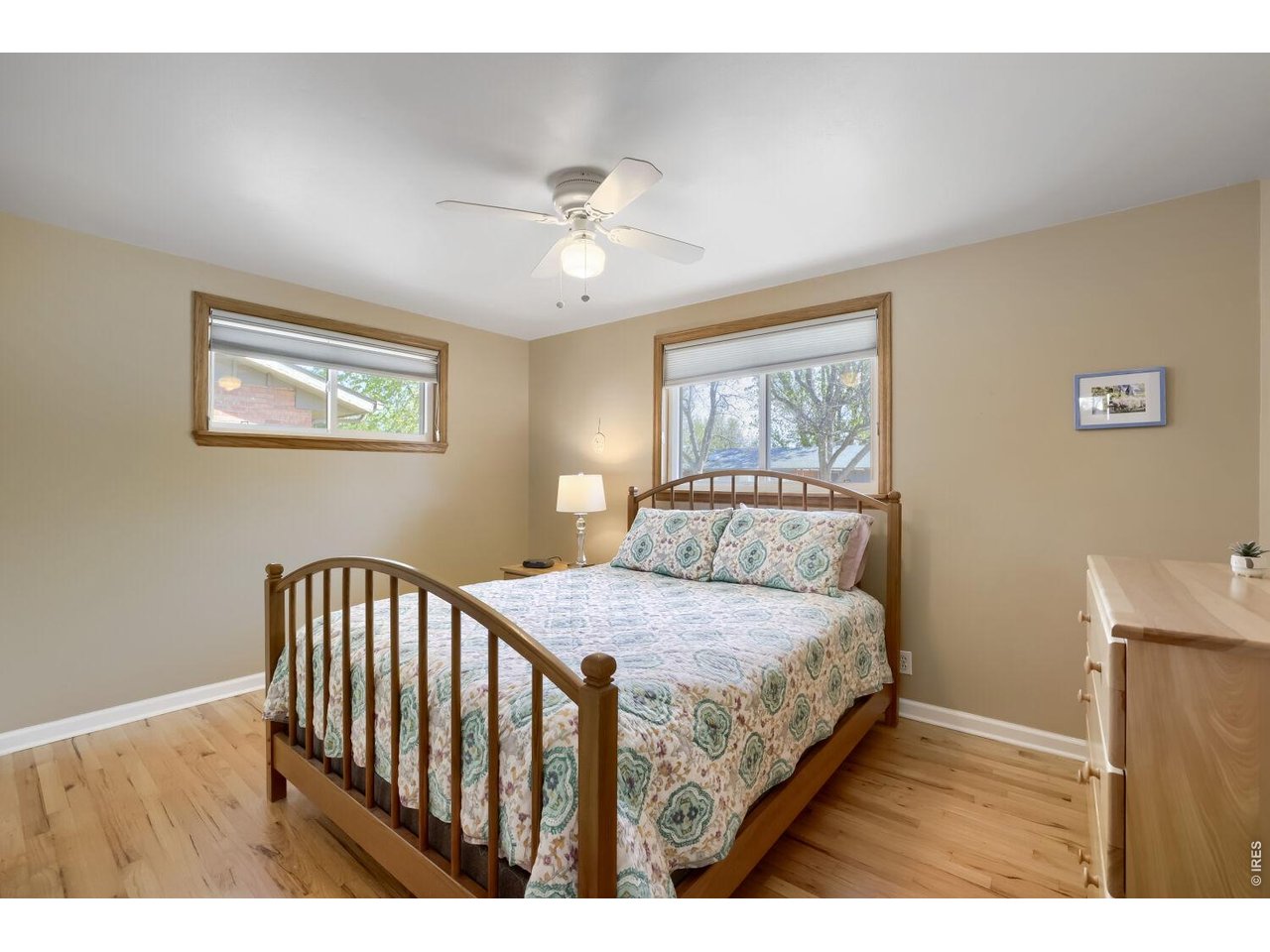 125 South 33rd Street Boulder, CO 80305 - Photo 9 of 17 a bedroom with a bed and a painting on the wall