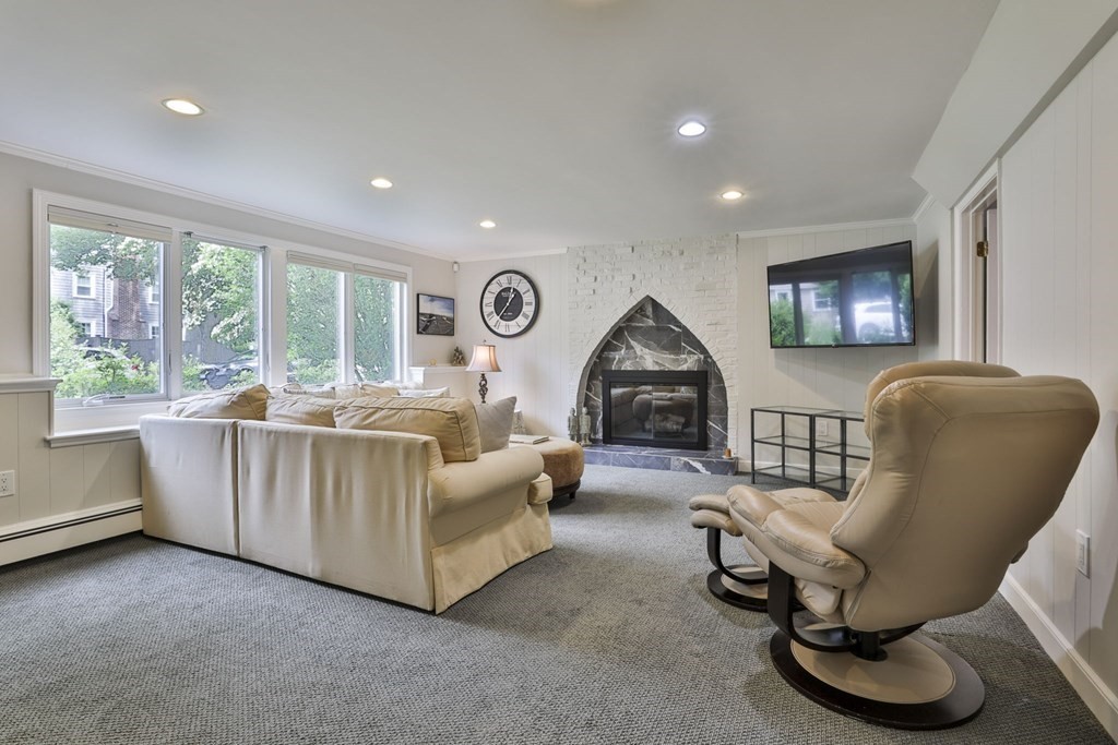 75 Valley Road Milton, MA 02186 - Photo 26 of 41 a living room with furniture and a large window