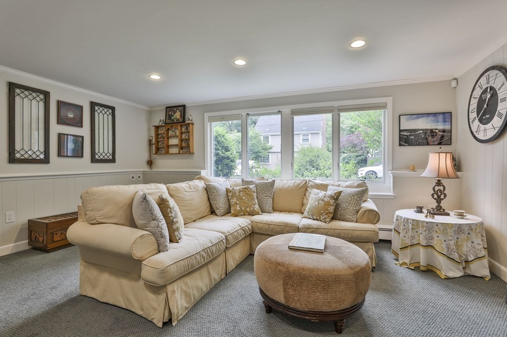 75 Valley Road Milton, MA 02186 - Photo 27 of 41 a living room with furniture and a large window