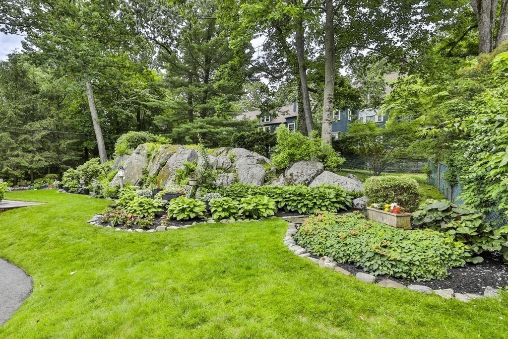 75 Valley Road Milton, MA 02186 - Photo 33 of 41 a view of garden with trees and flowers