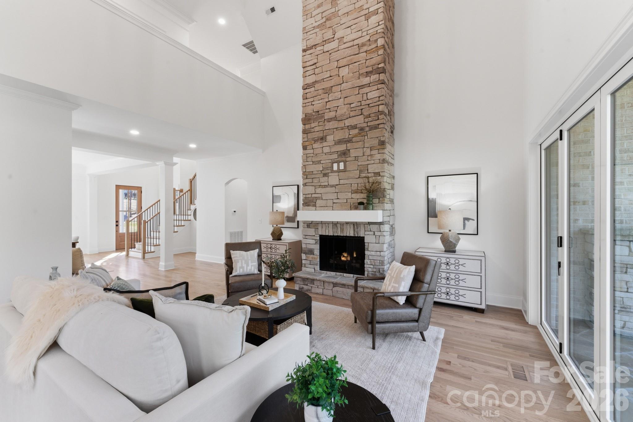 6405 Chimney Bluff Road Lancaster, SC 29720 - Photo 11 of 38 a living room with furniture and a fireplace