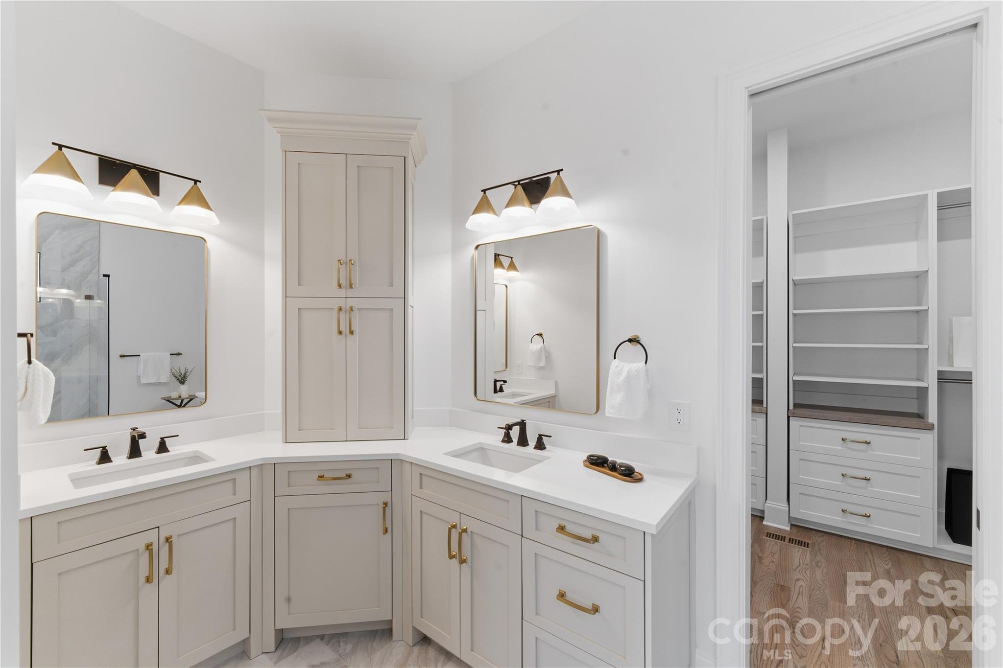 6405 Chimney Bluff Road Lancaster, SC 29720 - Photo 25 of 38 a bathroom with a double vanity sink and mirror