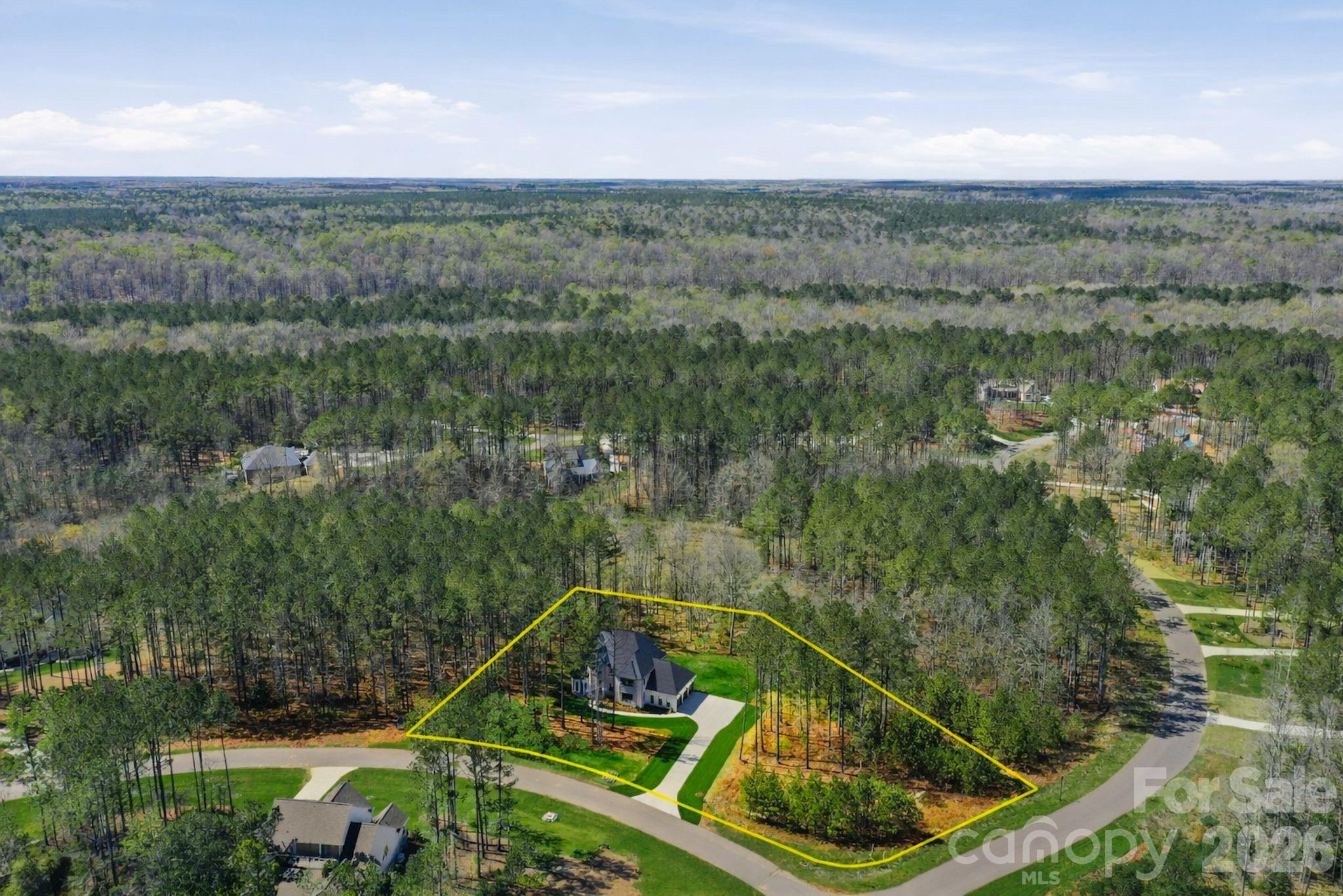 6405 Chimney Bluff Road Lancaster, SC 29720 - Photo 4 of 38 a view of a tennis court