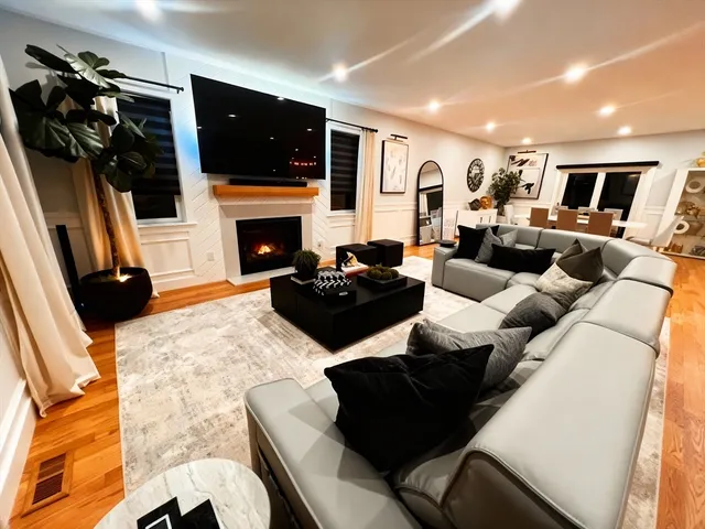 a bedroom with bed and flat screen tv