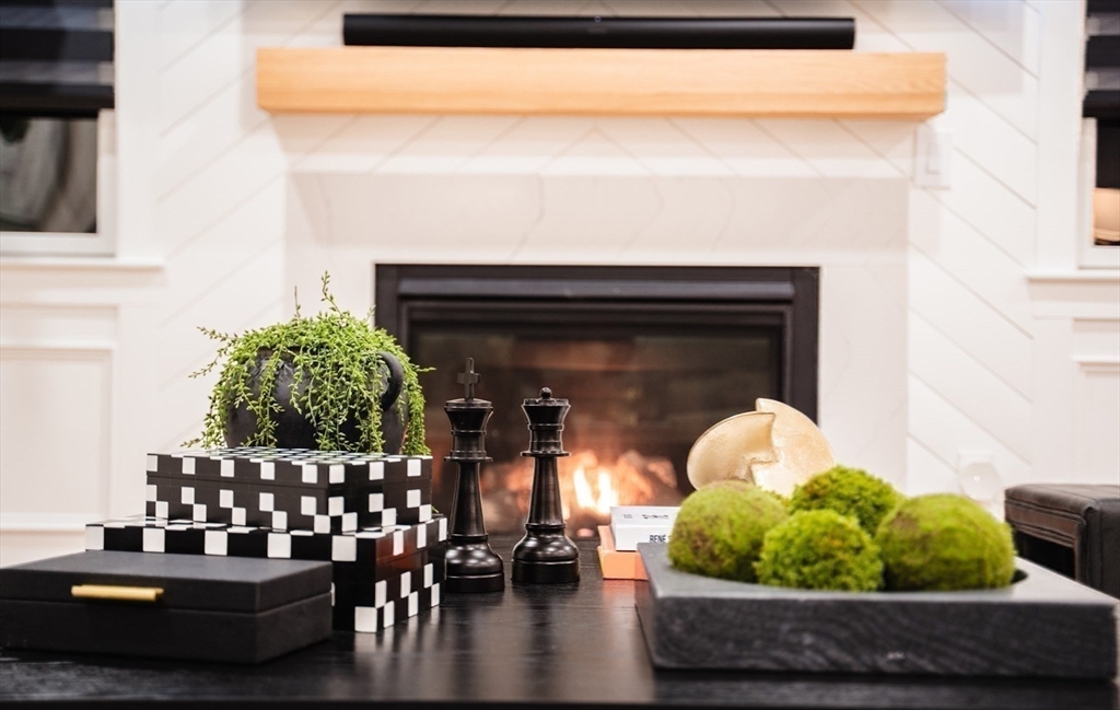 6 Rivendell Lane Millis, MA 02054 - Photo 15 of 41 a living room with furniture and a fireplace