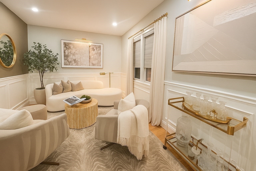 6 Rivendell Lane Millis, MA 02054 - Photo 18 of 41 a living room with furniture and a window