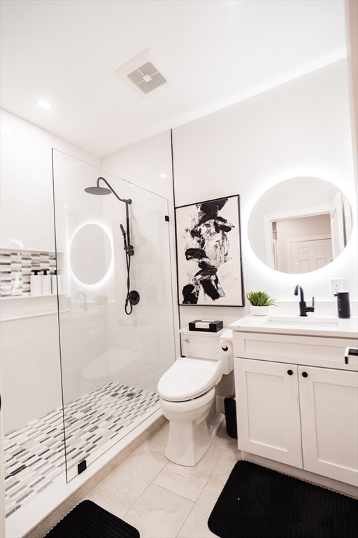 6 Rivendell Lane Millis, MA 02054 - Photo 20 of 41 a bathroom with a sink a toilet and shower