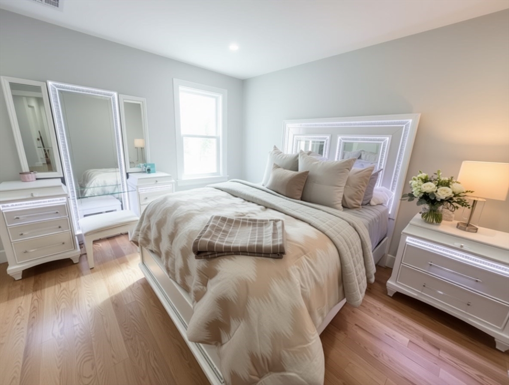 6 Rivendell Lane Millis, MA 02054 - Photo 28 of 41 a bedroom with a bed a couch and dresser