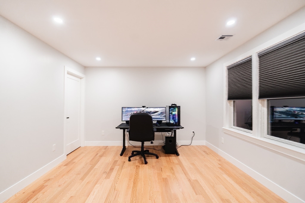 6 Rivendell Lane Millis, MA 02054 - Photo 30 of 41 a workspace with furniture and a wooden floor