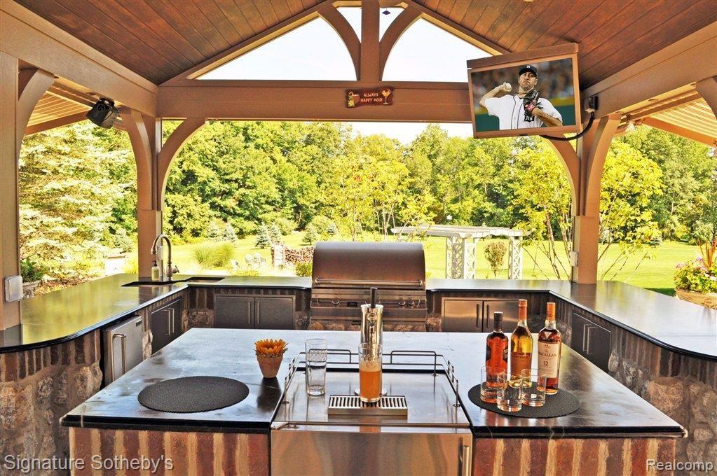 4519 Thornville Road Metamora, MI 48455 - Photo 66 of 99 With a STUNNING outdoor kitchen