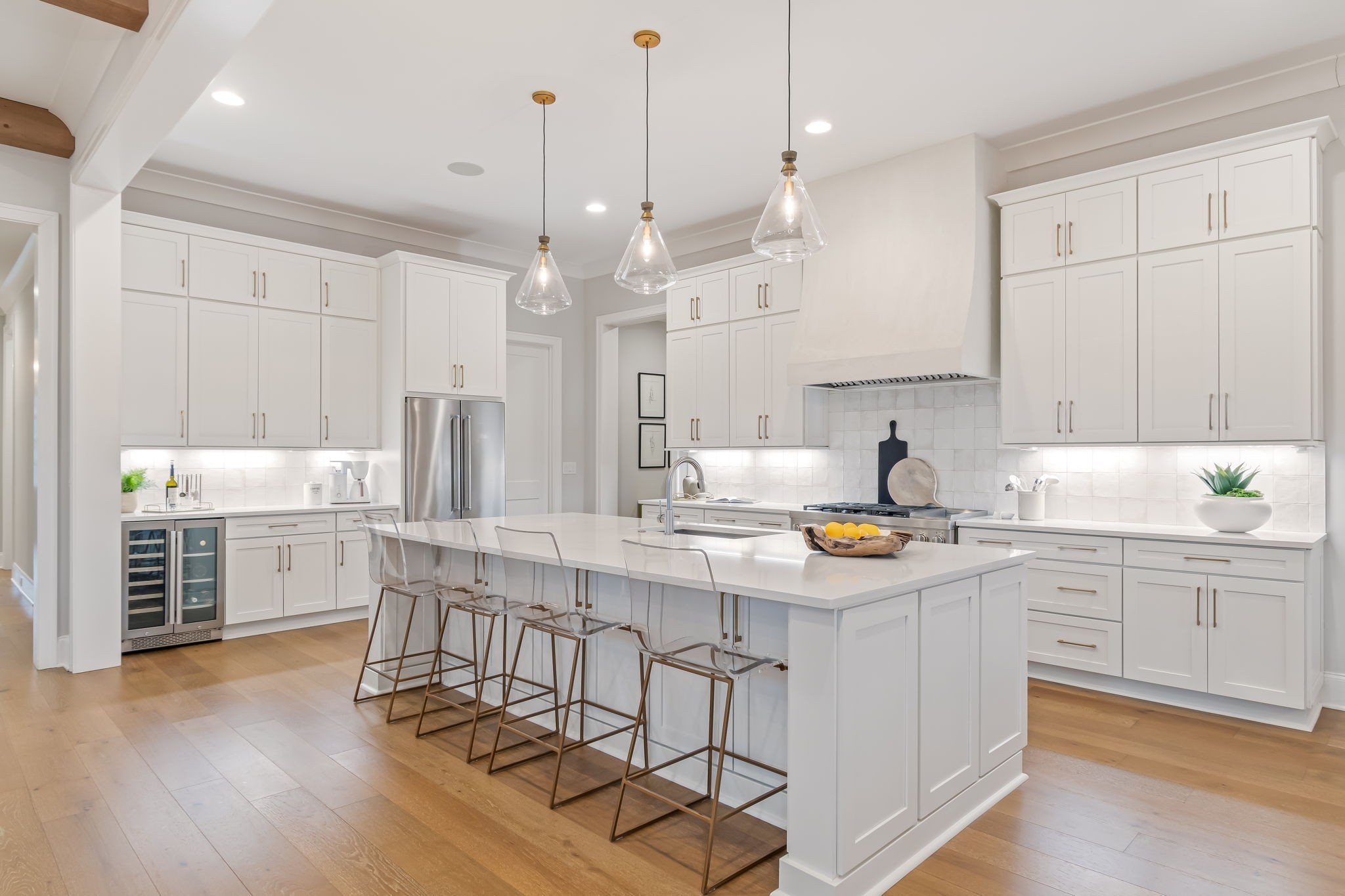 6304 Percheron Lane Arrington, TN 37014 - Photo 11 of 57 a kitchen with stainless steel appliances granite countertop a stove and cabinets with wooden floor