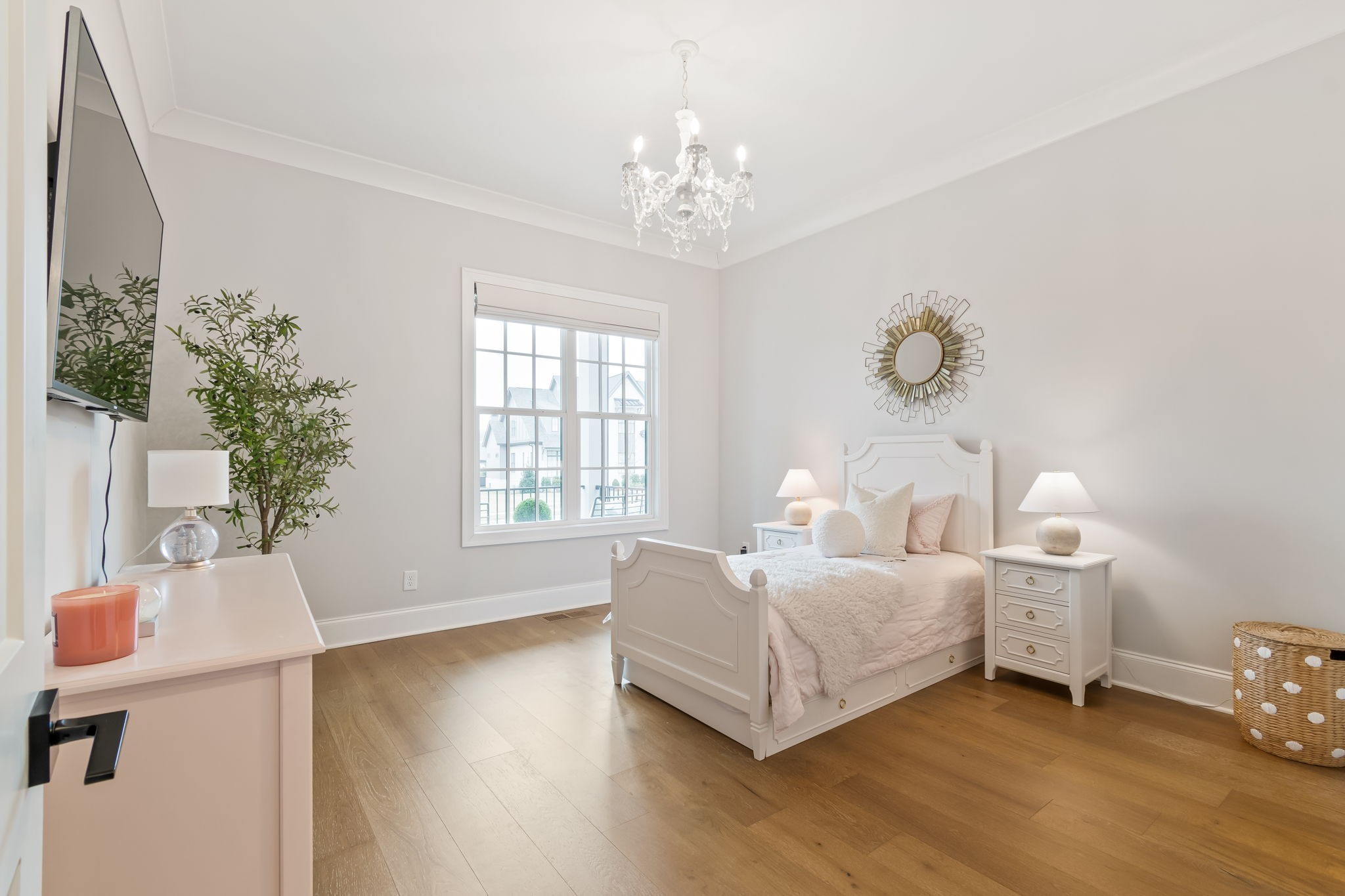 6304 Percheron Lane Arrington, TN 37014 - Photo 22 of 57 a bed room with a bed and a chandelier