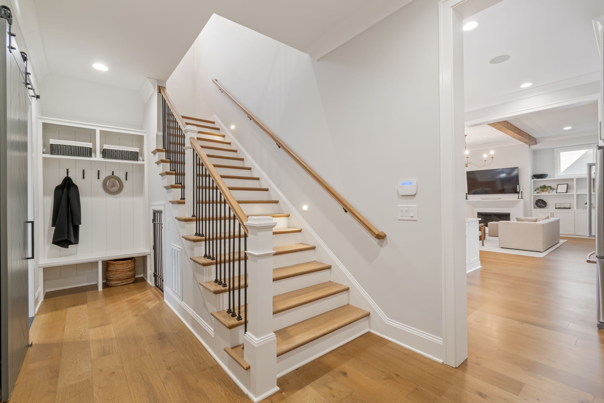 6304 Percheron Lane Arrington, TN 37014 - Photo 26 of 57 a view of entryway and hall with wooden floor