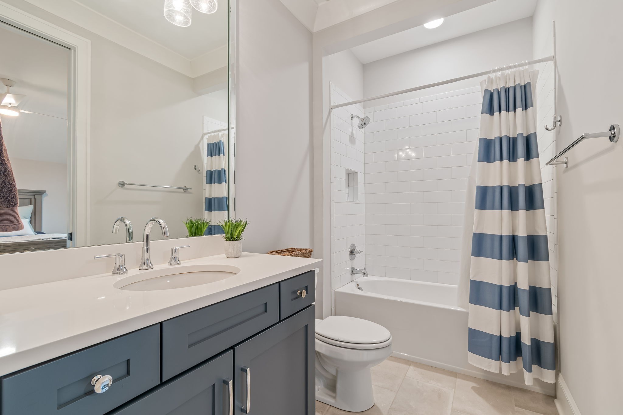 6304 Percheron Lane Arrington, TN 37014 - Photo 38 of 57 a bathroom with a sink a toilet a shower and a mirror