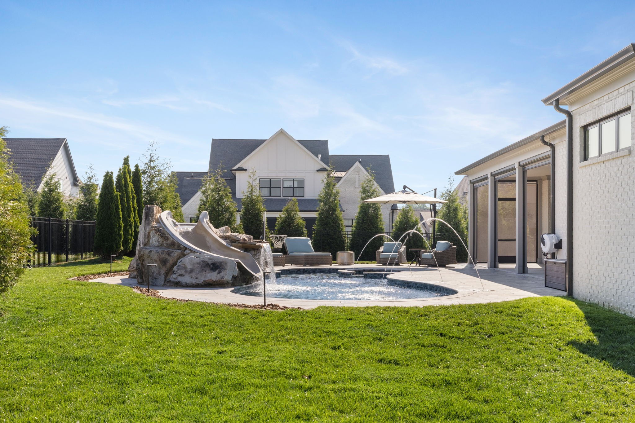 6304 Percheron Lane Arrington, TN 37014 - Photo 50 of 57 a view of a house with backyard water fountain and sitting area